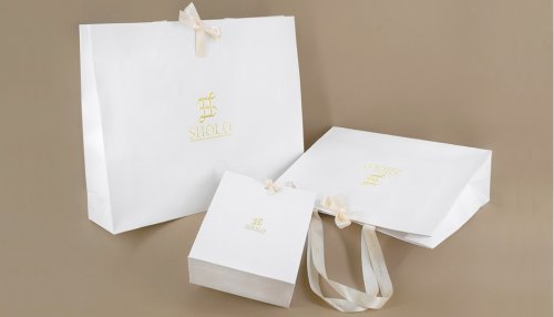 Rissmann crée de luxueux sacs et coffrets en papier effet cuir pour Sholo